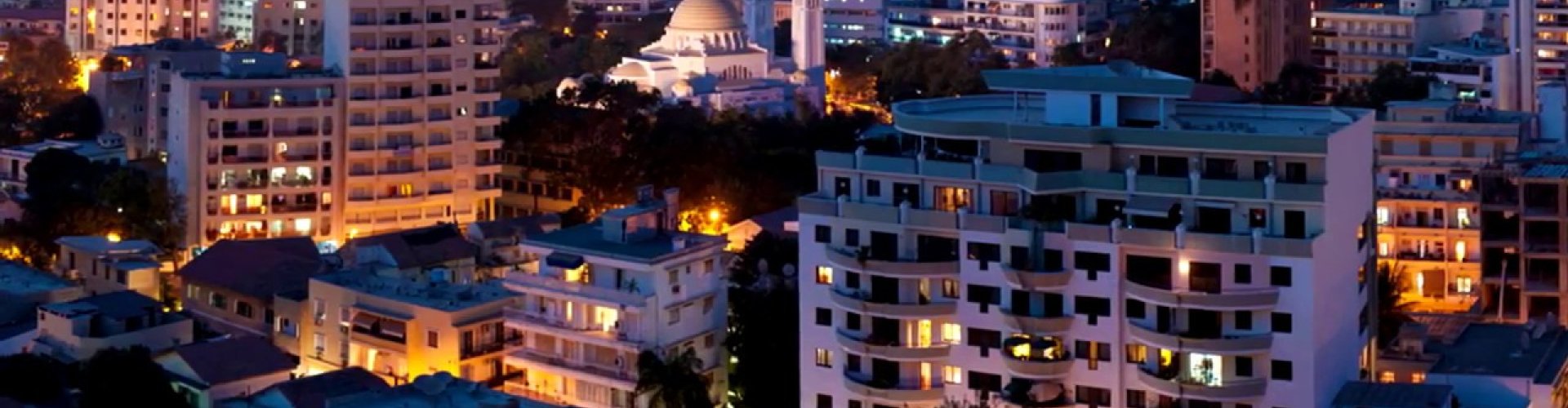 Luxury car parked in Dakar cityscape