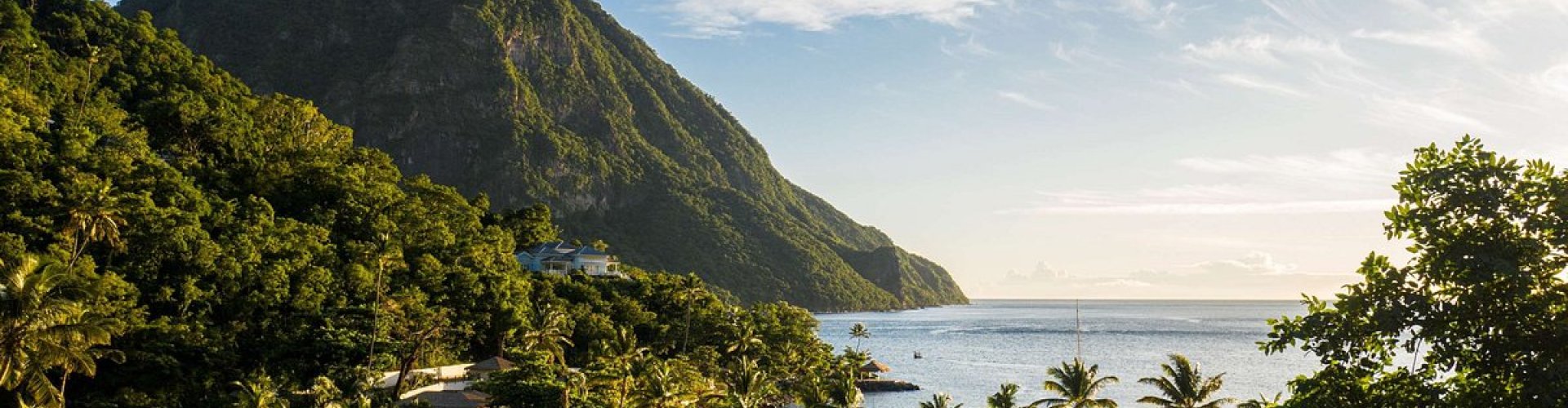 Luxury car driving through Saint Lucia landscape