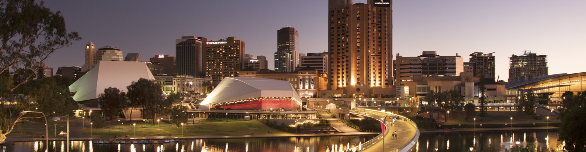 Luxury limousine in Adelaide cityscape