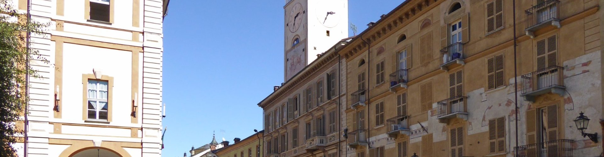 Luxury vehicle cruising near Bernezzo landscape