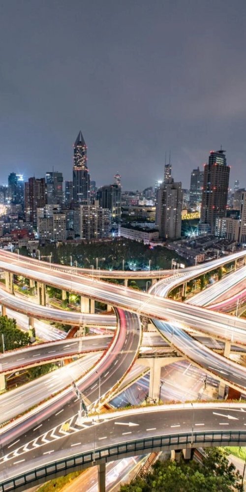 Chauffeur opening car door in Shanghai