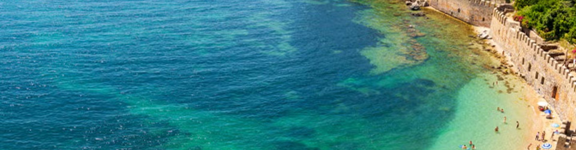 Luxury vehicle cruising through Antalya coastline