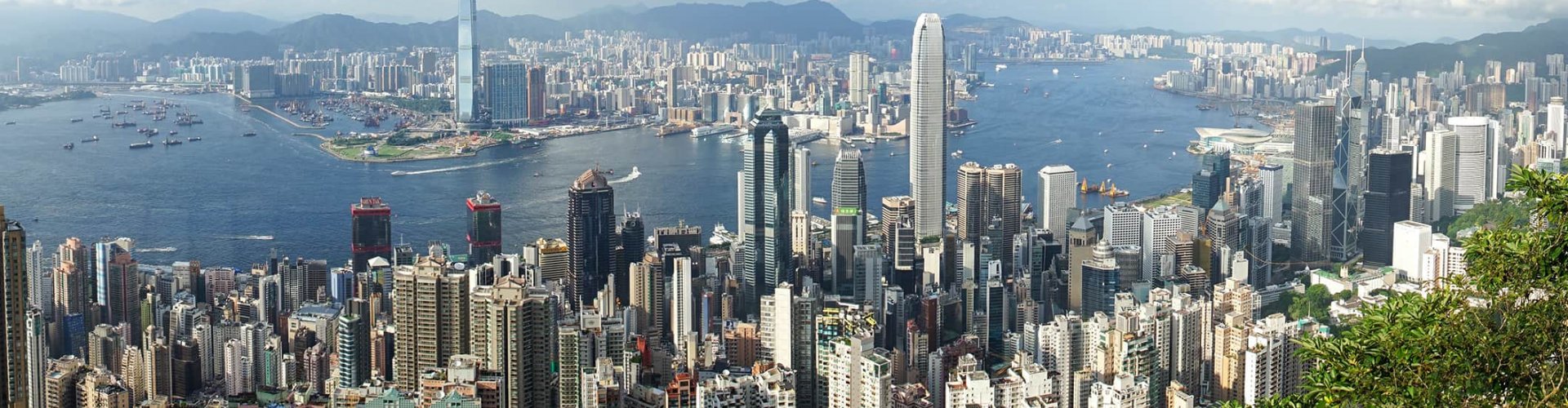 Luxury limousine in Hong Kong cityscape