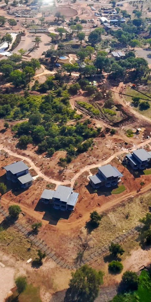 Luxury vehicle on road near Victoria Falls