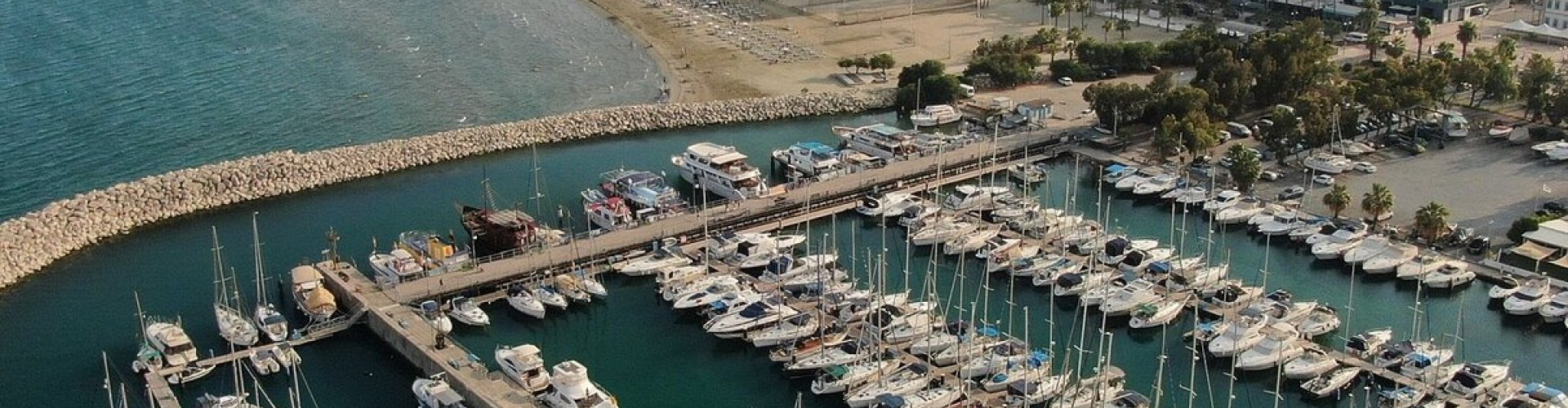 Luxury car parked along Larnaca waterfront
