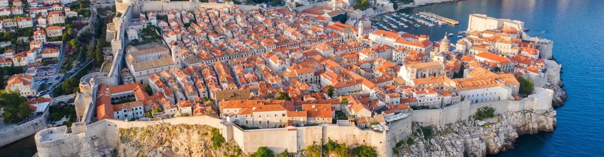 Luxury limousine in Dubrovnik setting sun